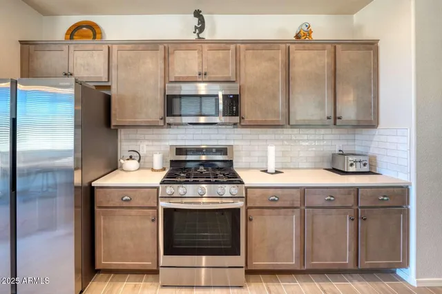 a view of a livingroom with furniture and a chandelier