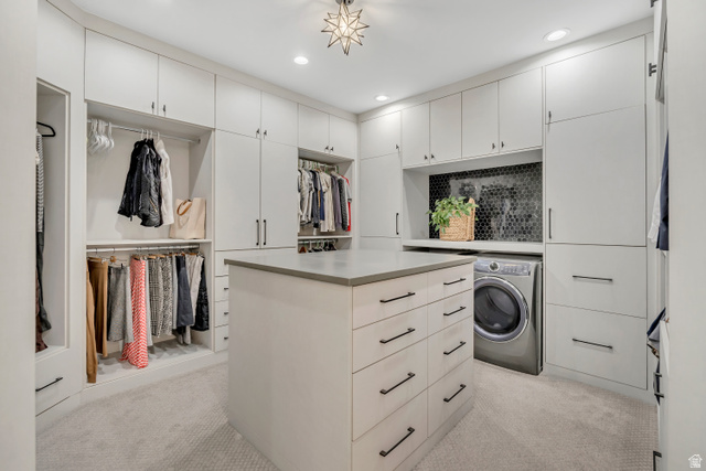 1720 Hillcrest Circle Mapleton, UT 84664 - Photo 58 of 116 Walk in closet featuring washer / clothes dryer and light colored carpet