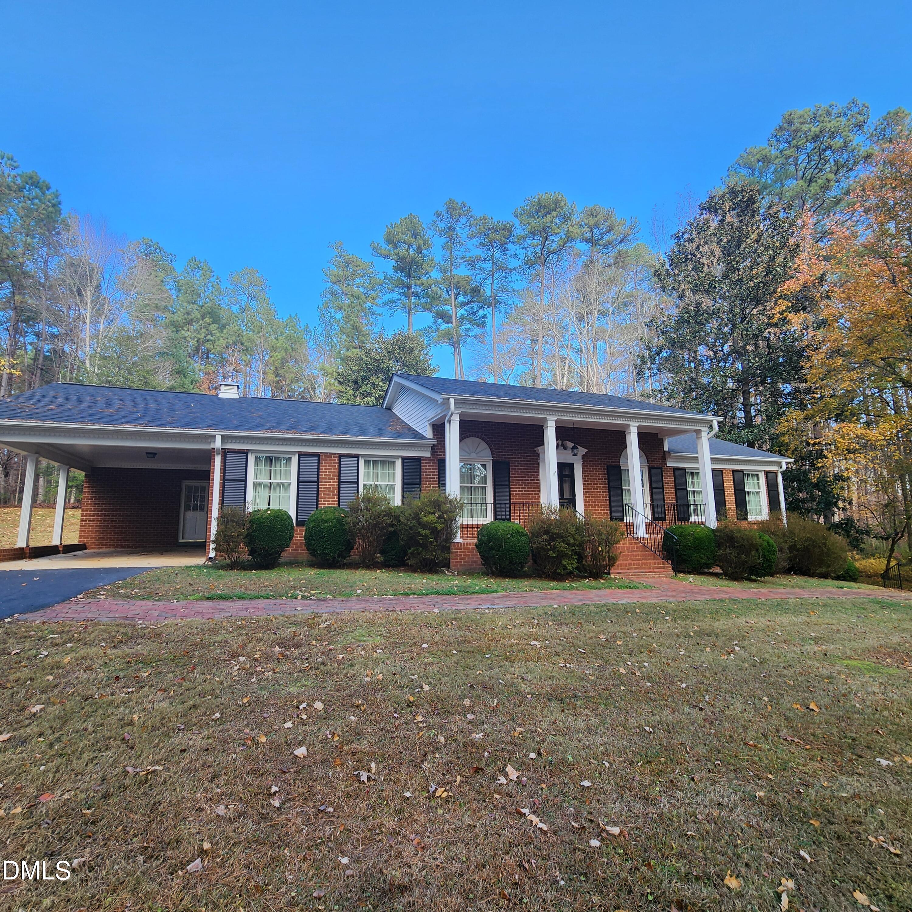 744 Durham Road Wake Forest, NC 27587 - Photo 1 of 25 a front view of a house with a yard