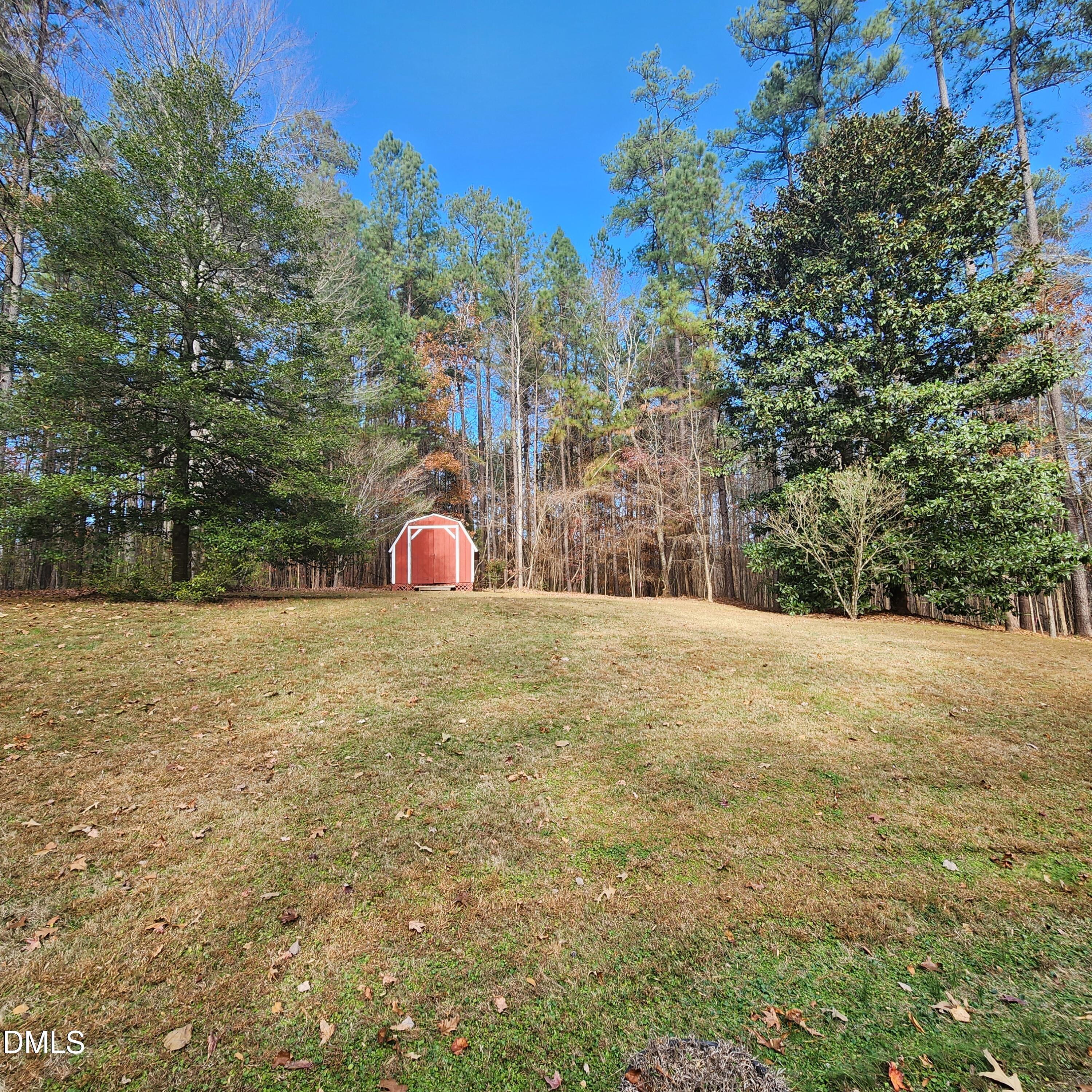 744 Durham Road Wake Forest, NC 27587 - Photo 2 of 25 a view of outdoor space and basketball court