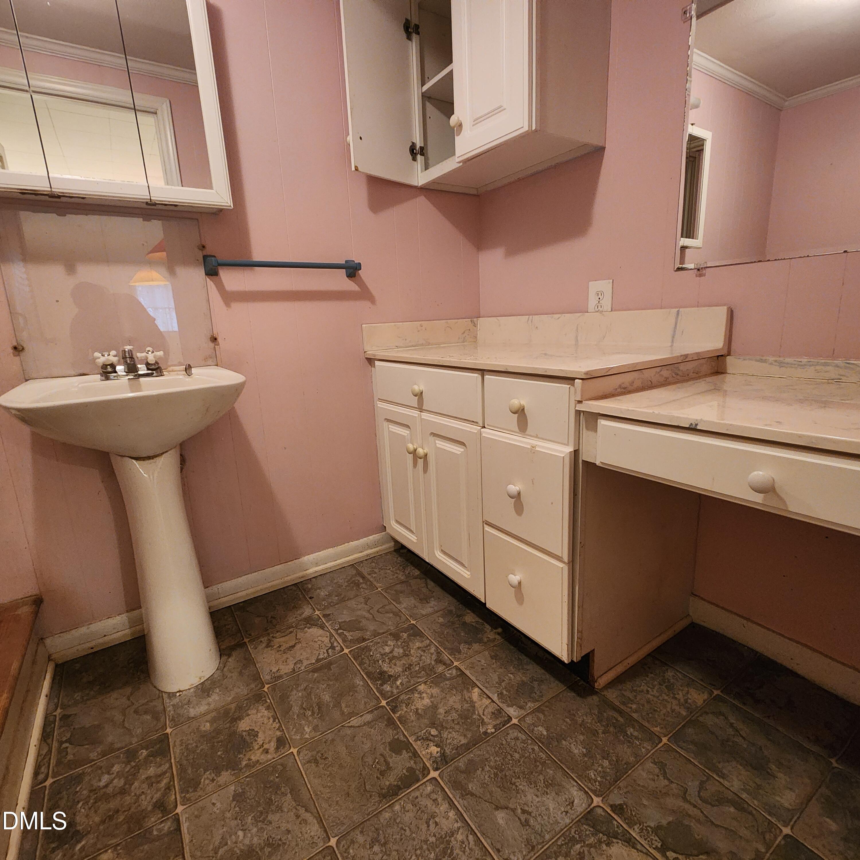 744 Durham Road Wake Forest, NC 27587 - Photo 22 of 25 a kitchen with a sink and cabinets