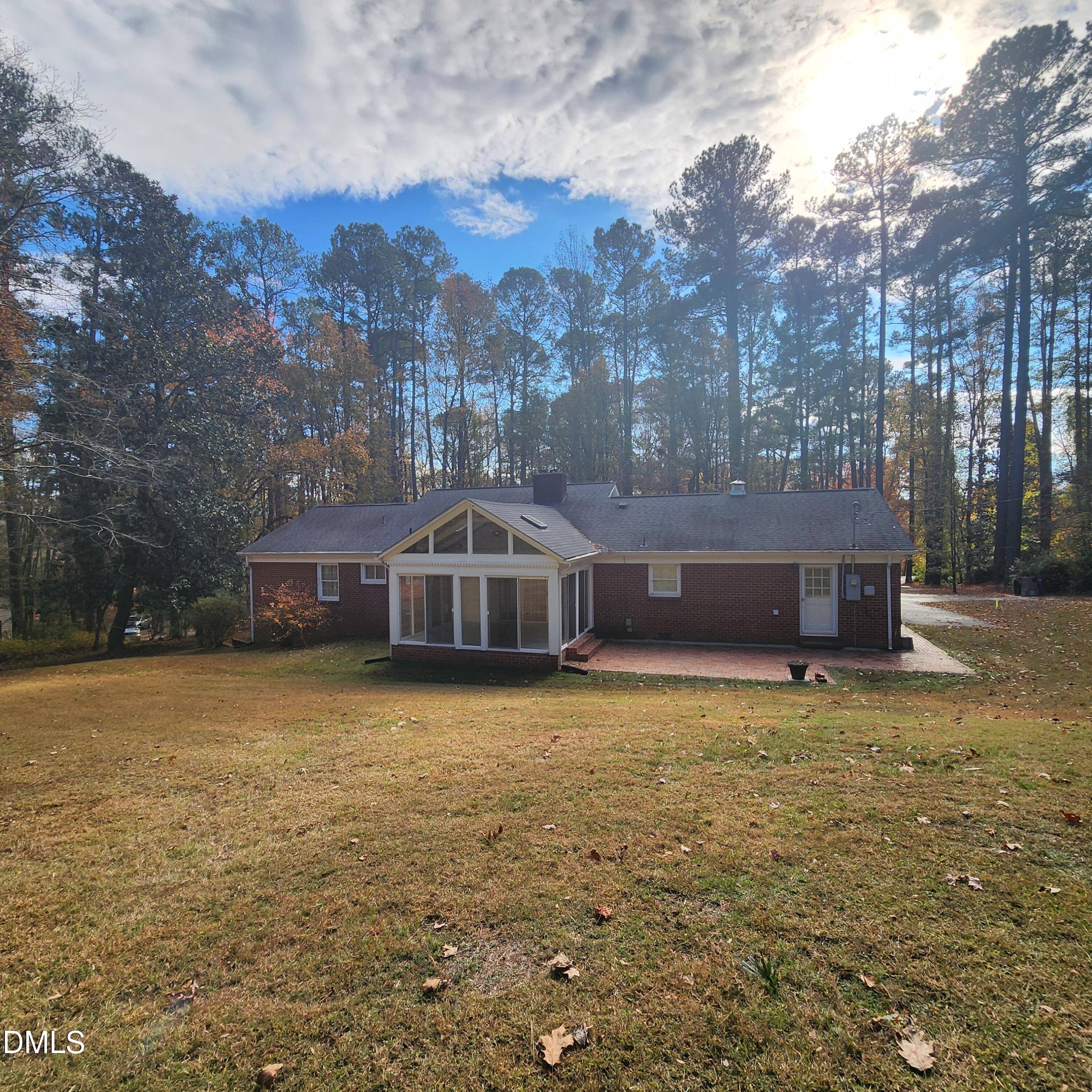 744 Durham Road Wake Forest, NC 27587 - Photo 3 of 25 a front view of a house with a yard