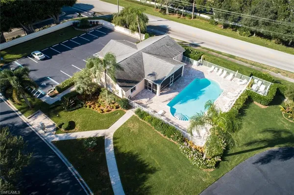 a view of swimming pool with a yard