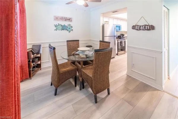 a view of a dining room with furniture