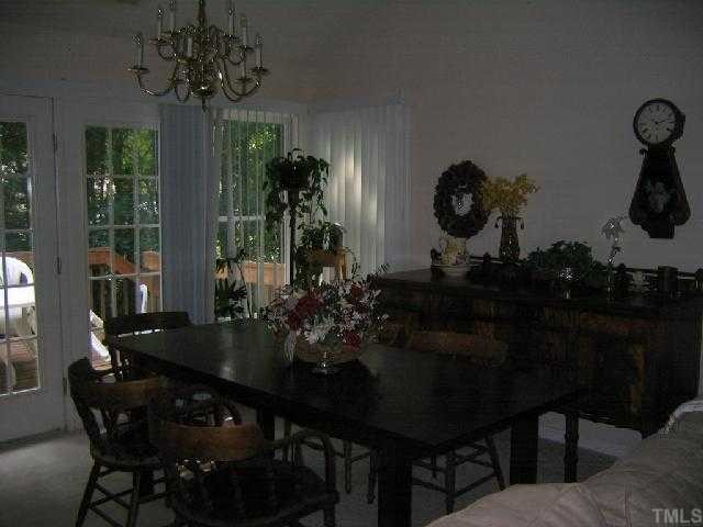 3525 Singleleaf Lane Raleigh, NC 27616 - Photo 4 of 10 Your new Dining Room is right off the Kitchen with French Doors to the Deck.