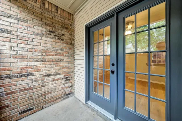 a view of entry way with wooden door
