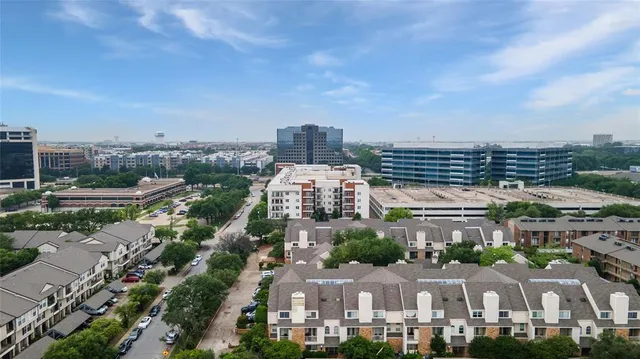 a view of a city that has tall buildings