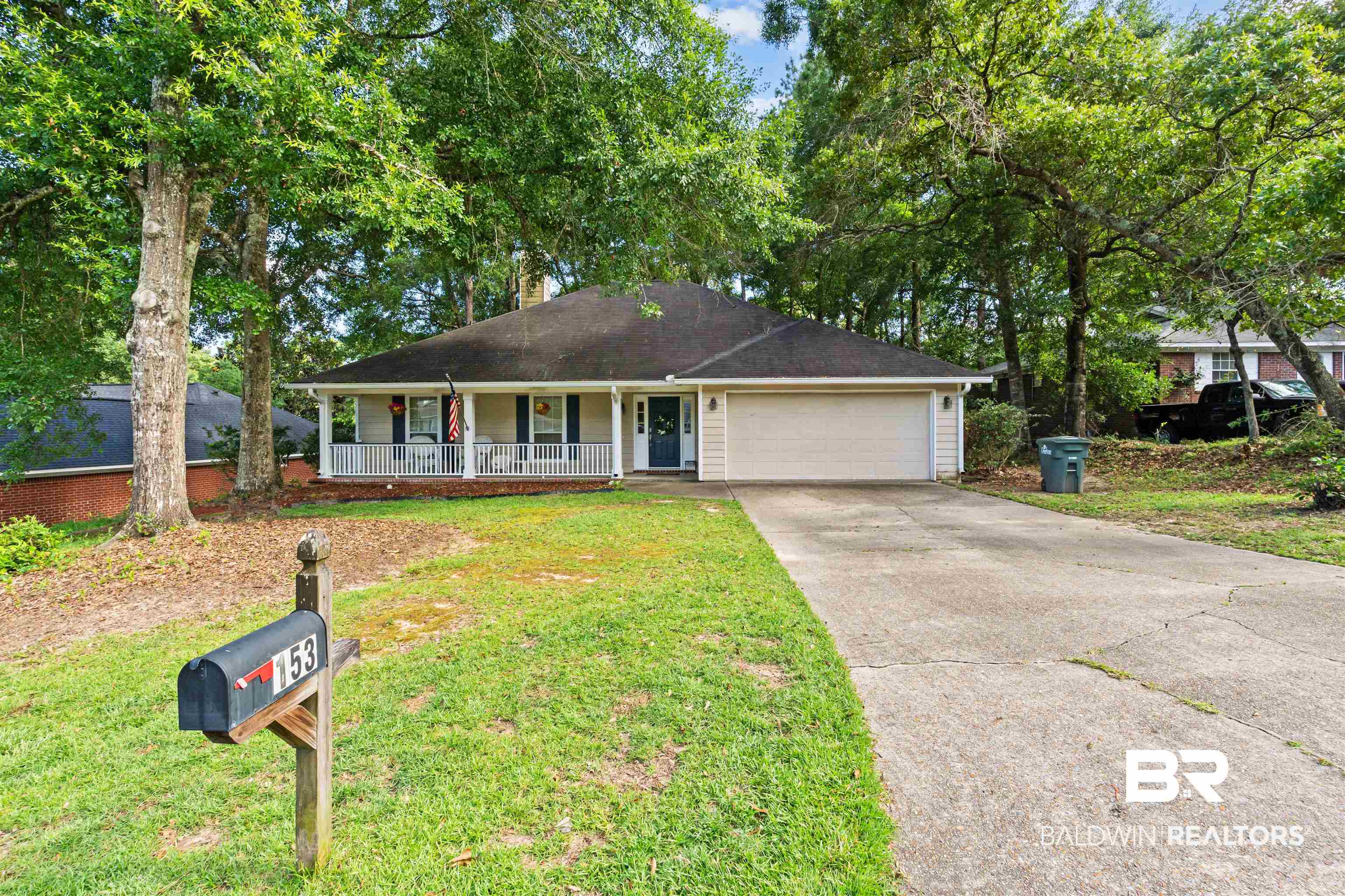 153 Lakeview Loop Daphne, AL 36526 - Photo 5 of 56 A wide driveway and welcoming front elevation provide both convenience and a warm arrival for family and guests.