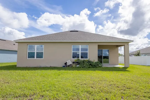 a view of a house with a garden