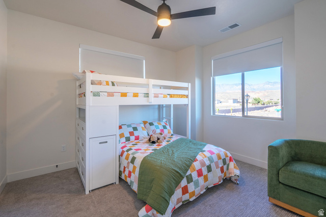 2972 West 570 North Hurricane, UT 84737 - Photo 68 of 104 Bedroom featuring carpet floors, a ceiling fan, and a mountain view