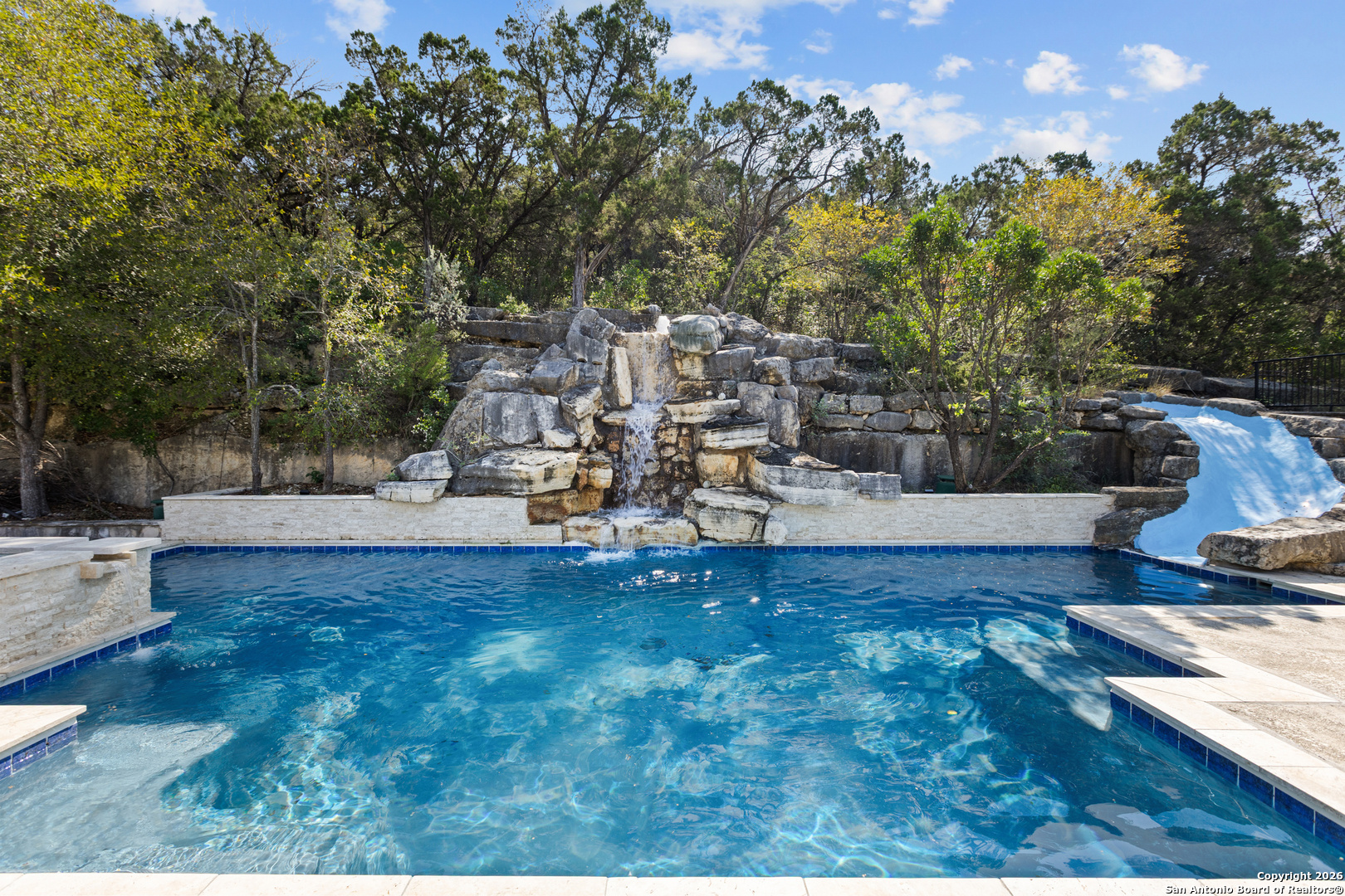 10924 Reyes Canyons Helotes, TX 78023 - Photo 4 of 61 a view of a house with swimming pool