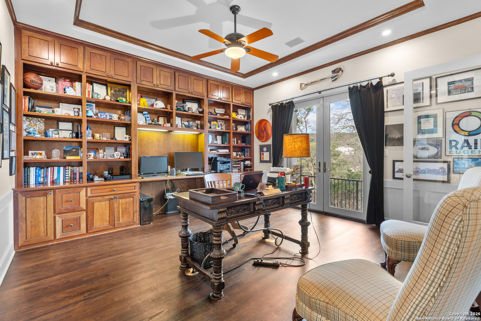 10924 Reyes Canyons Helotes, TX 78023 - Photo 41 of 61 a view of a workspace with furniture and a potted plant
