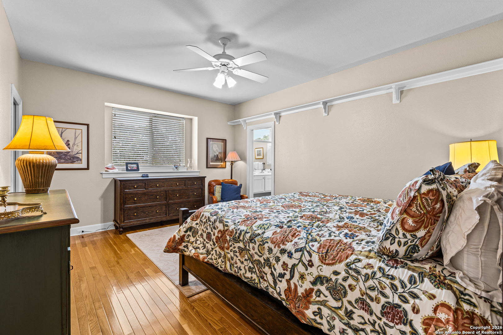 10924 Reyes Canyons Helotes, TX 78023 - Photo 49 of 61 a bed room with a bed and a chair