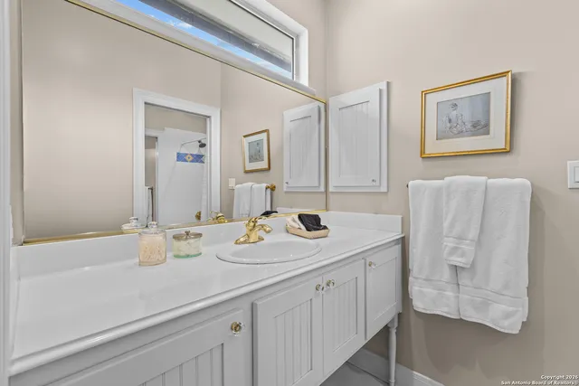 an aerial view of house with yard and outdoor seating