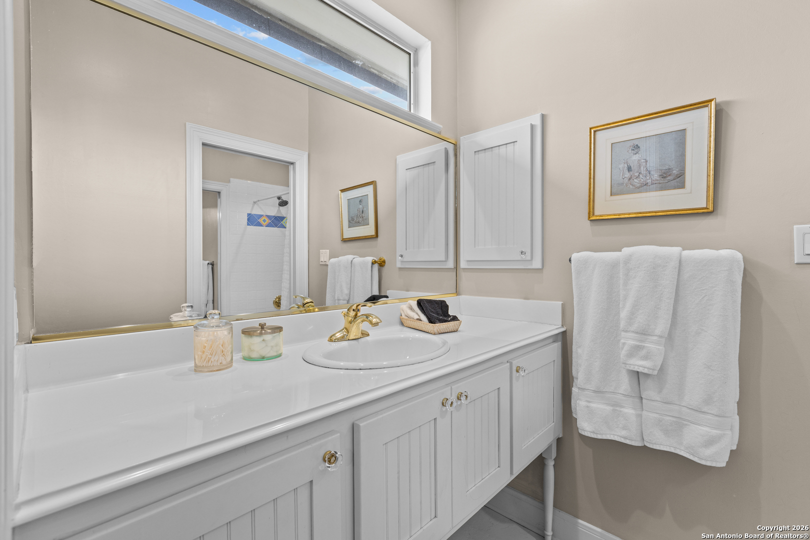 10924 Reyes Canyons Helotes, TX 78023 - Photo 50 of 61 a bathroom with a sink and a mirror