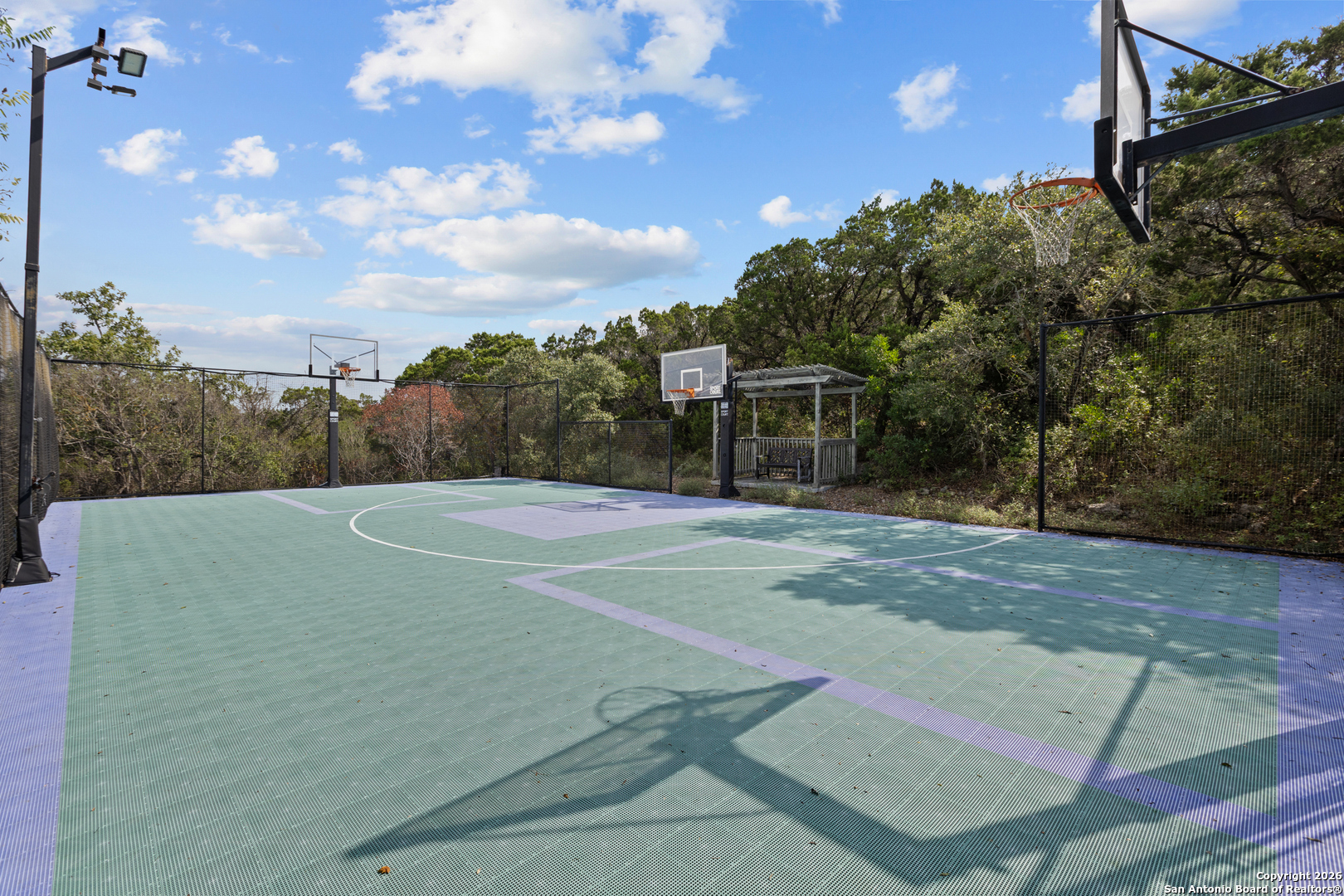 10924 Reyes Canyons Helotes, TX 78023 - Photo 6 of 61 a view of a basket ball ground