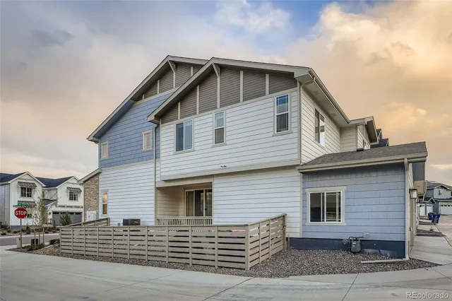 a front view of a house with garage