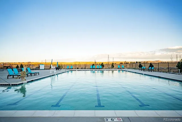 a view of swimming pool with an ocean view