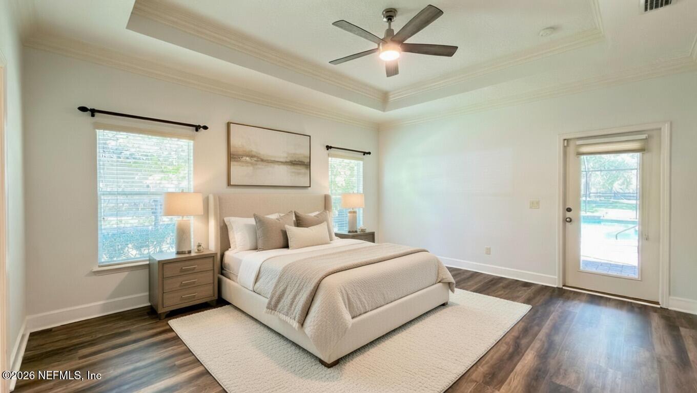226 Towers Ranch Drive St. Augustine, FL 32092 - Photo 19 of 36 a bedroom with a large bed and a window