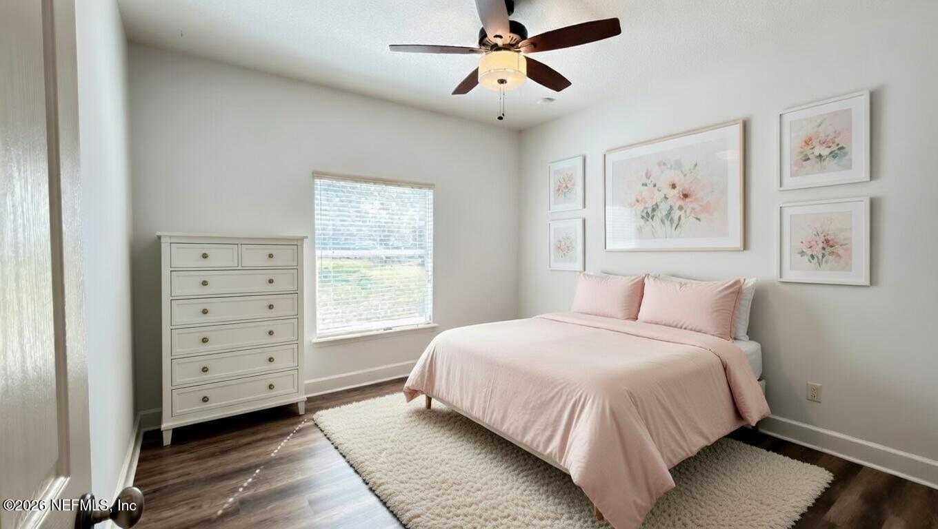 226 Towers Ranch Drive St. Augustine, FL 32092 - Photo 25 of 36 a bedroom with a large bed and a window