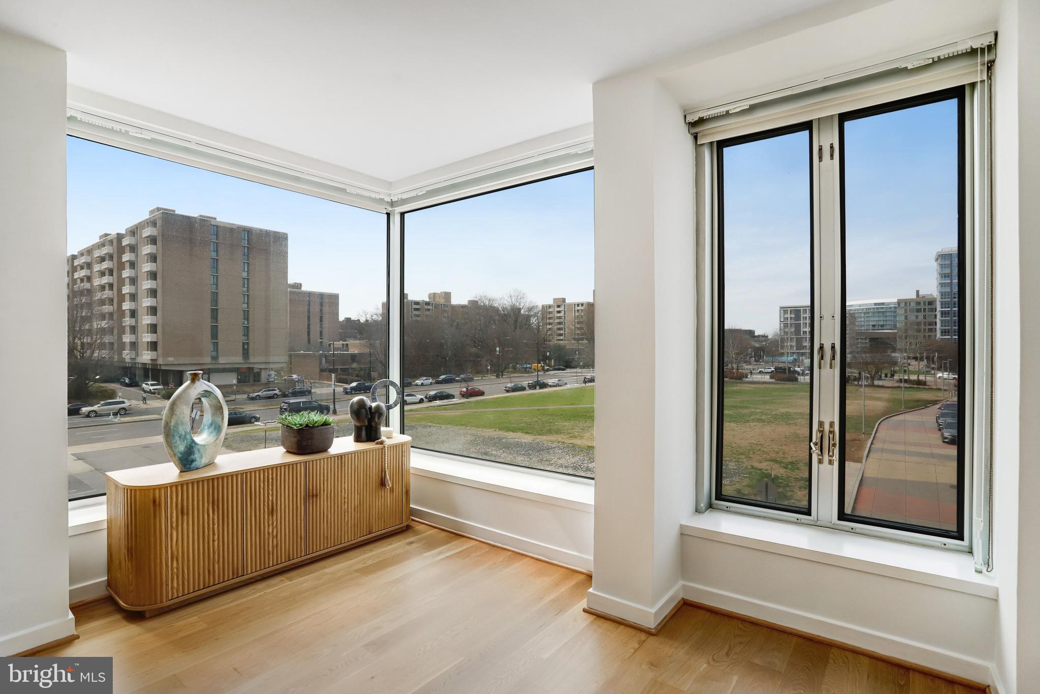 1101 3rd Street Southwest, Unit 206 Washington, DC 20024 - Photo 15 of 53 a view of a living room and a large window