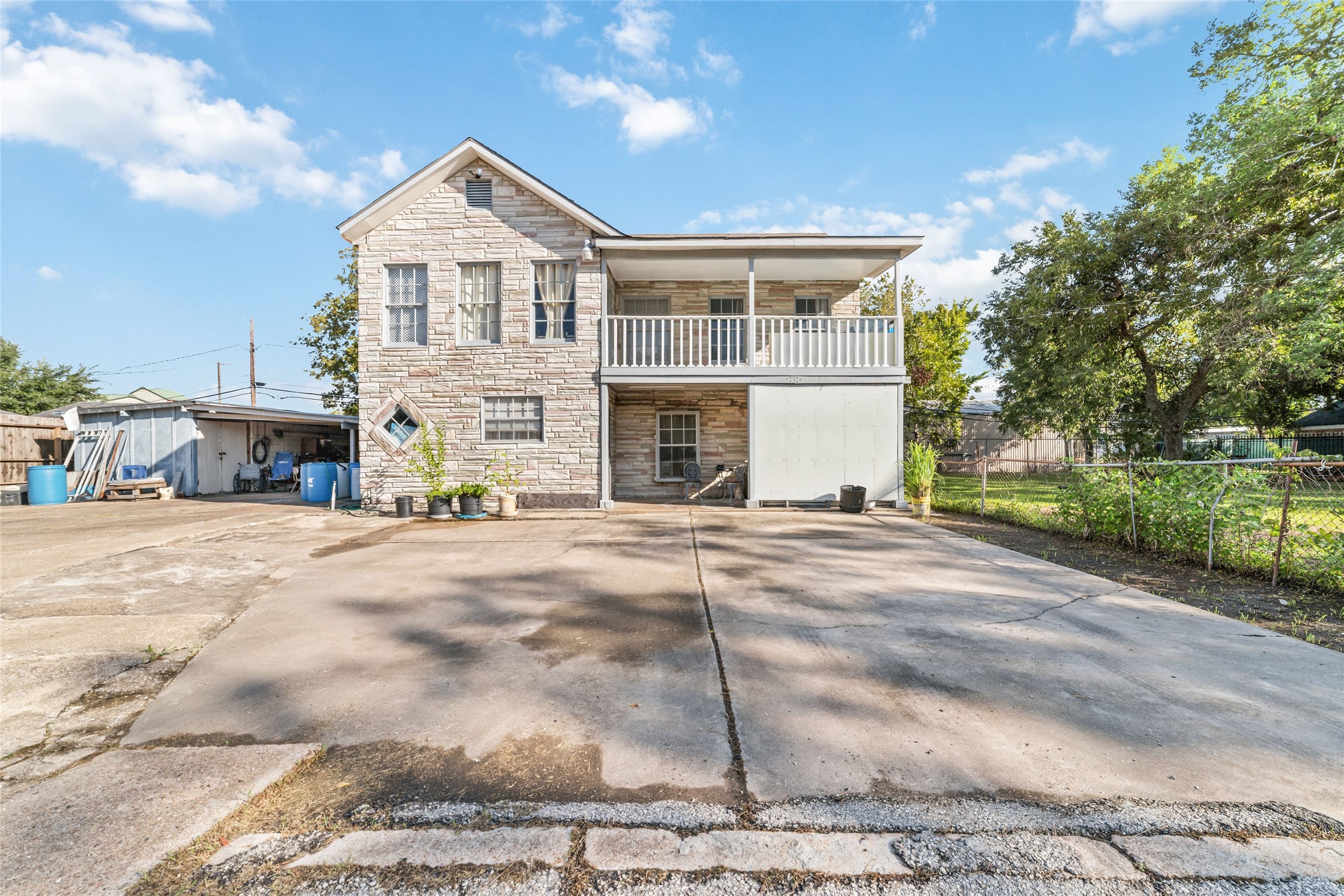 8023 Findlay Street Houston, TX 77017 - Photo 1 of 24 a front view of a house with a yard
