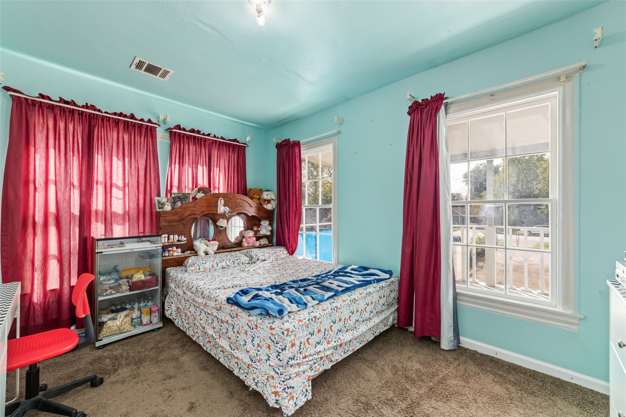 8023 Findlay Street Houston, TX 77017 - Photo 14 of 24 a bed room with a bed and a window