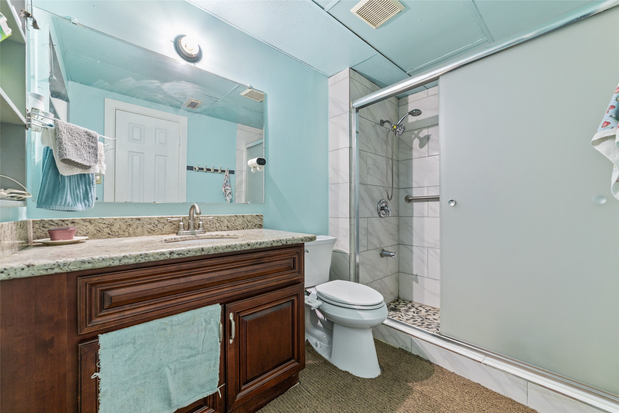 8023 Findlay Street Houston, TX 77017 - Photo 15 of 24 a bathroom with a granite countertop sink toilet and shower