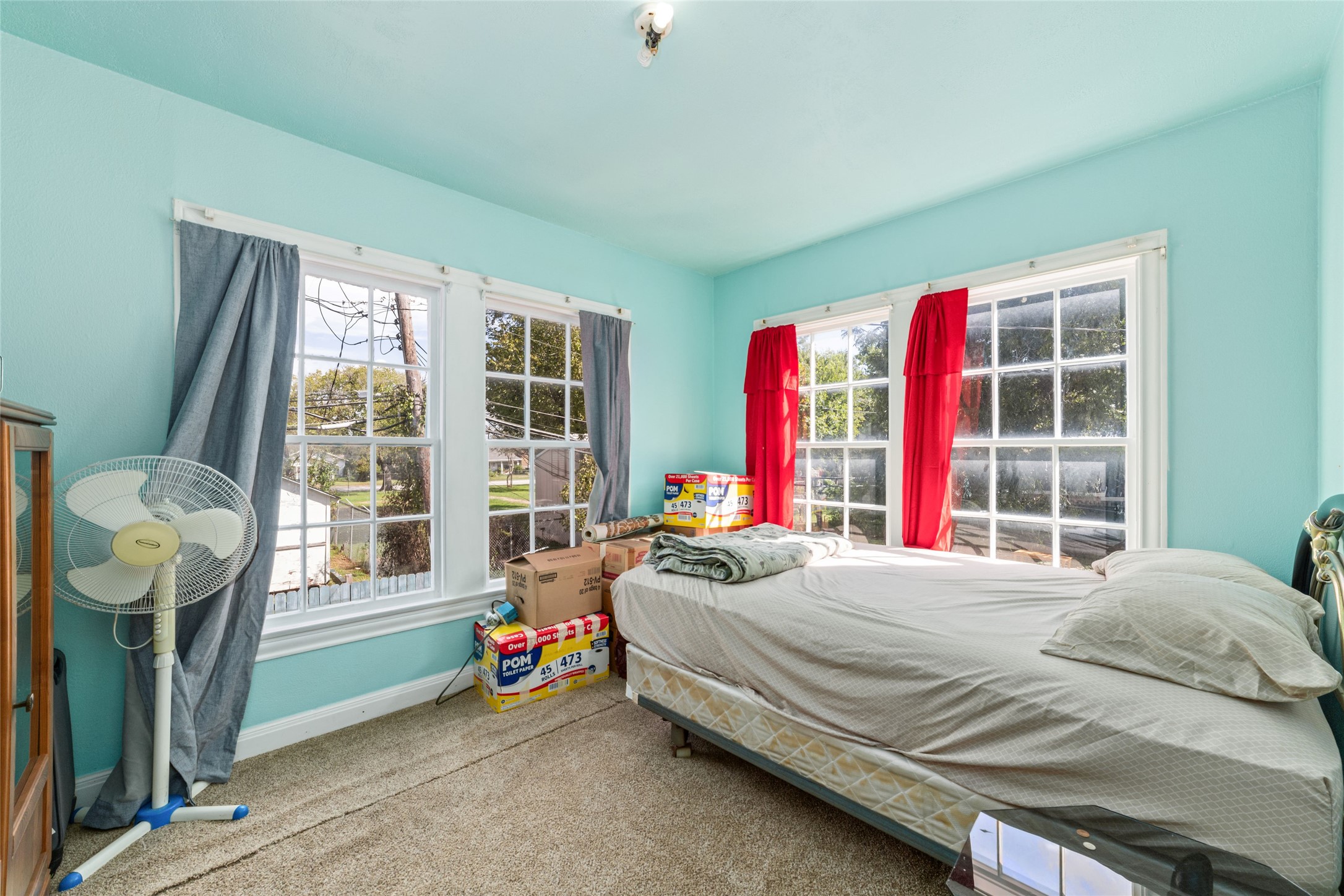 8023 Findlay Street Houston, TX 77017 - Photo 16 of 24 a bedroom with a bed next to a window with outer view