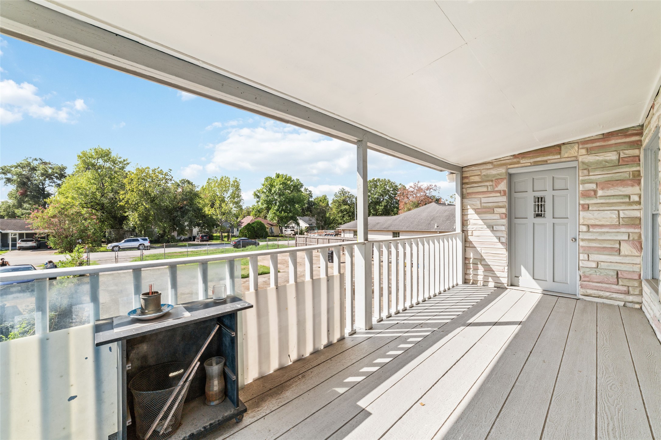 8023 Findlay Street Houston, TX 77017 - Photo 5 of 24 a view of a balcony with wooden floor