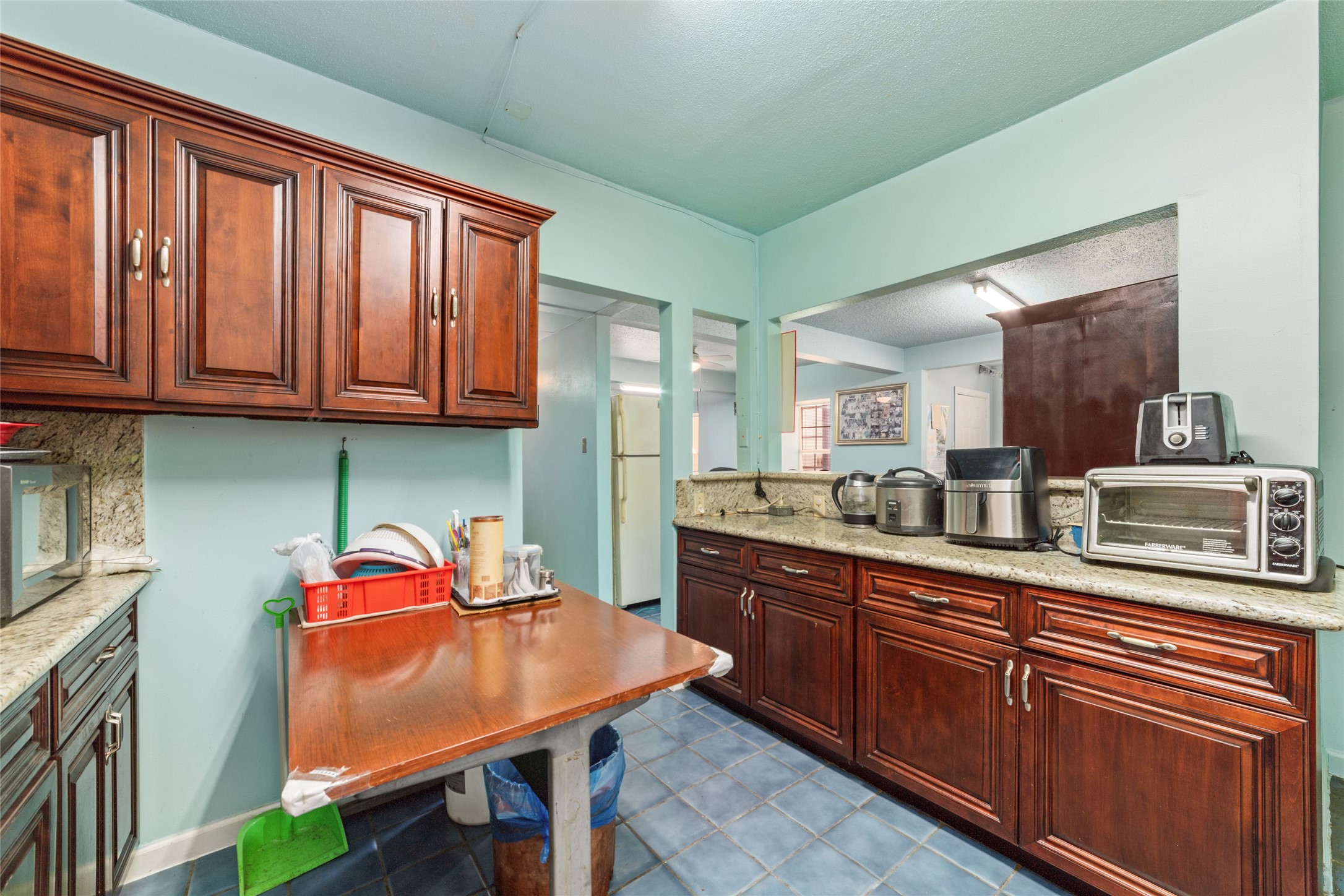 8023 Findlay Street Houston, TX 77017 - Photo 8 of 24 a kitchen with stainless steel appliances granite countertop a sink dishwasher stove and cabinets