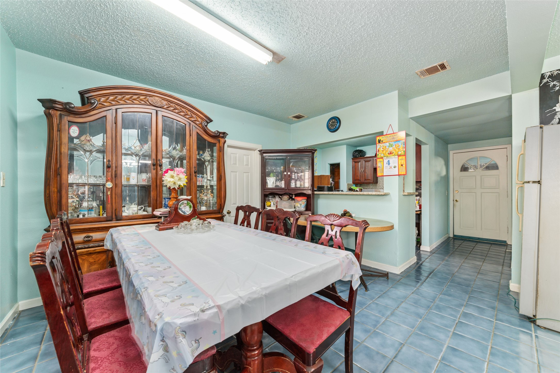 8023 Findlay Street Houston, TX 77017 - Photo 10 of 24 a view of a dining room with furniture and a large window