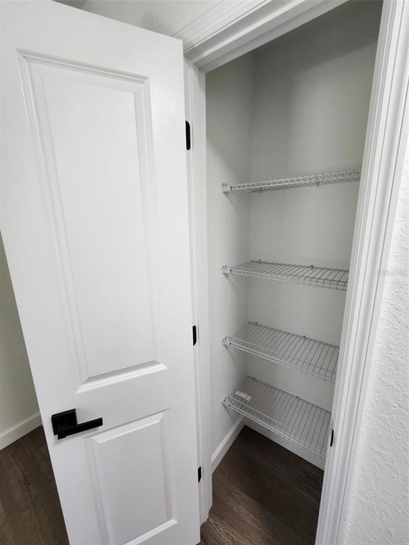 24370 Falcon Avenue Dunnellon, FL 34431 - Photo 11 of 24 a room with storage and utility