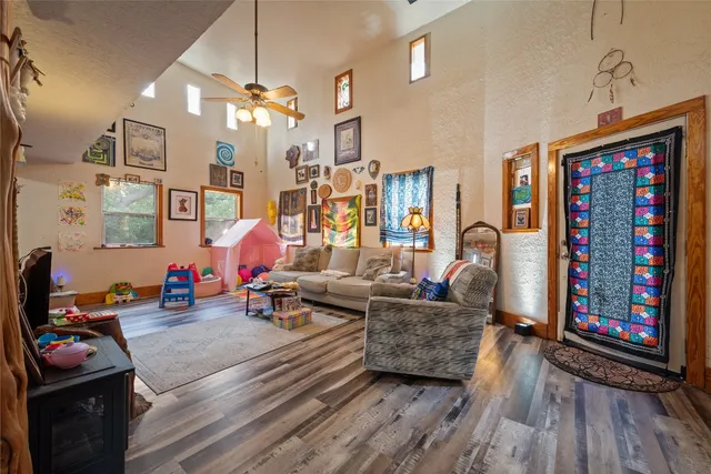 a living room with furniture and a table