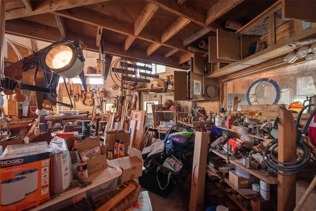 a view of a chairs and tables in a patio