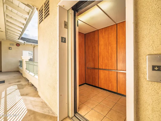 a view of a bathroom with a shower and a bath tub