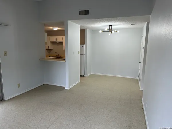 an empty room with an entryway