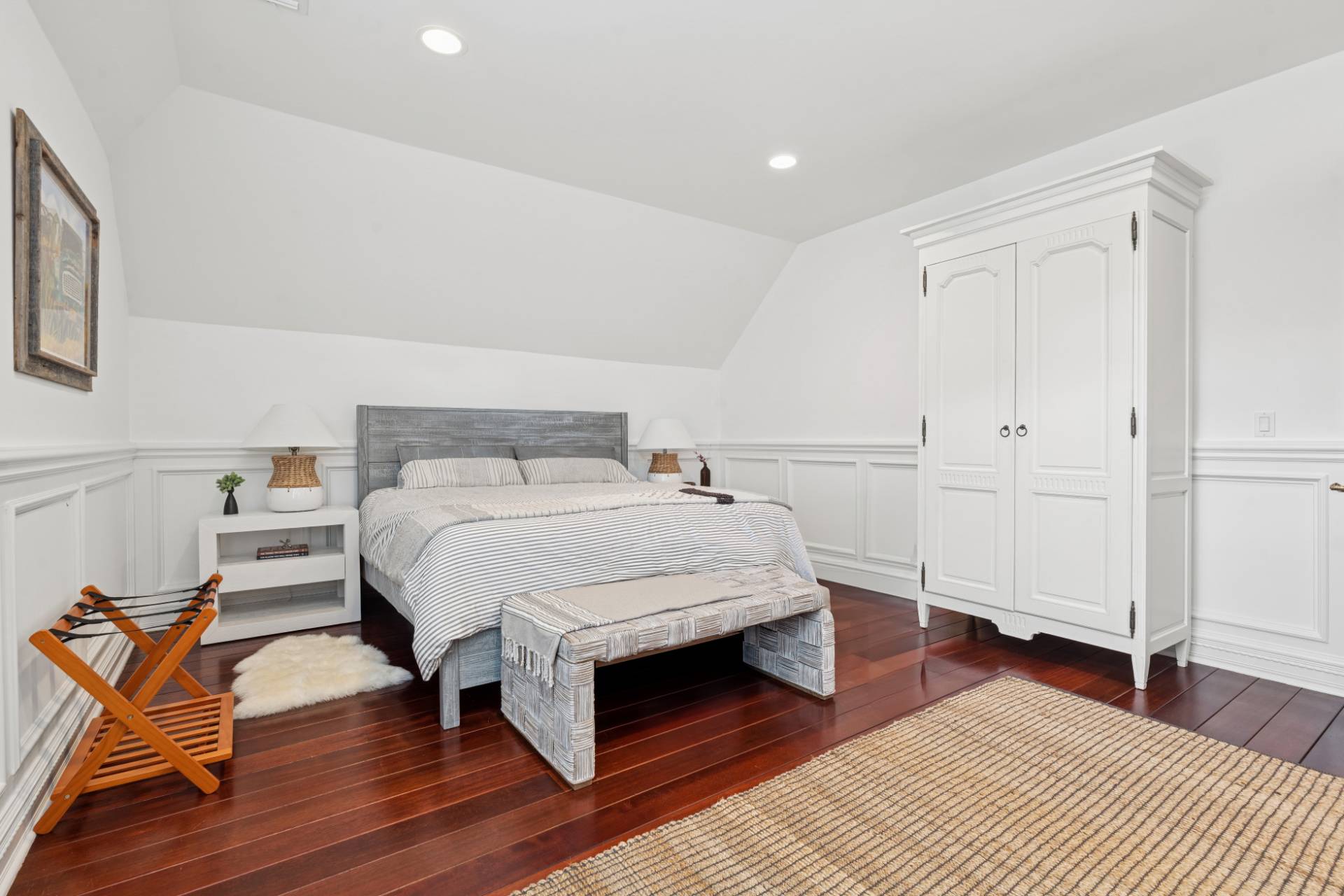 Undisclosed Address Remsenburg, NY 11960 - Photo 19 of 35 a bedroom with a bed and wooden floor