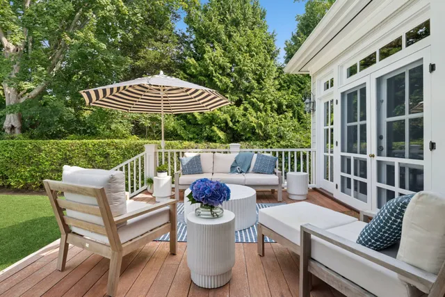 a view of a patio in the backyard