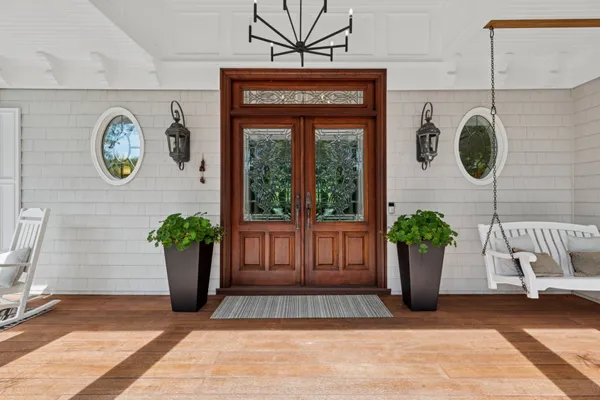 a view of a entryway door front of house