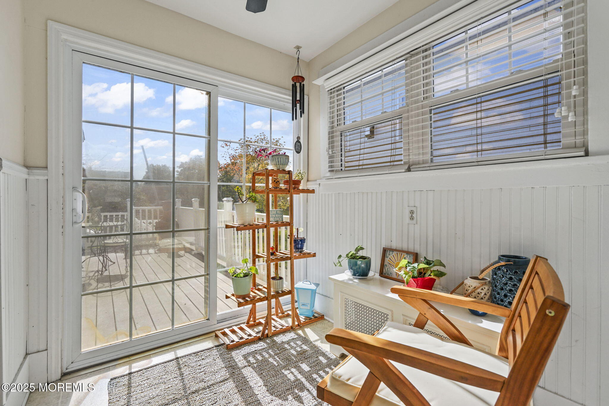 22 Albany Road Neptune Township, NJ 07753 - Photo 12 of 40 a living room with furniture and a floor to ceiling window
