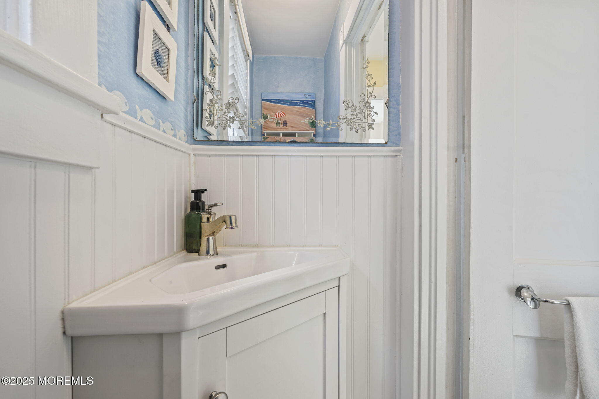 22 Albany Road Neptune Township, NJ 07753 - Photo 13 of 40 a bathroom with a sink and a mirror
