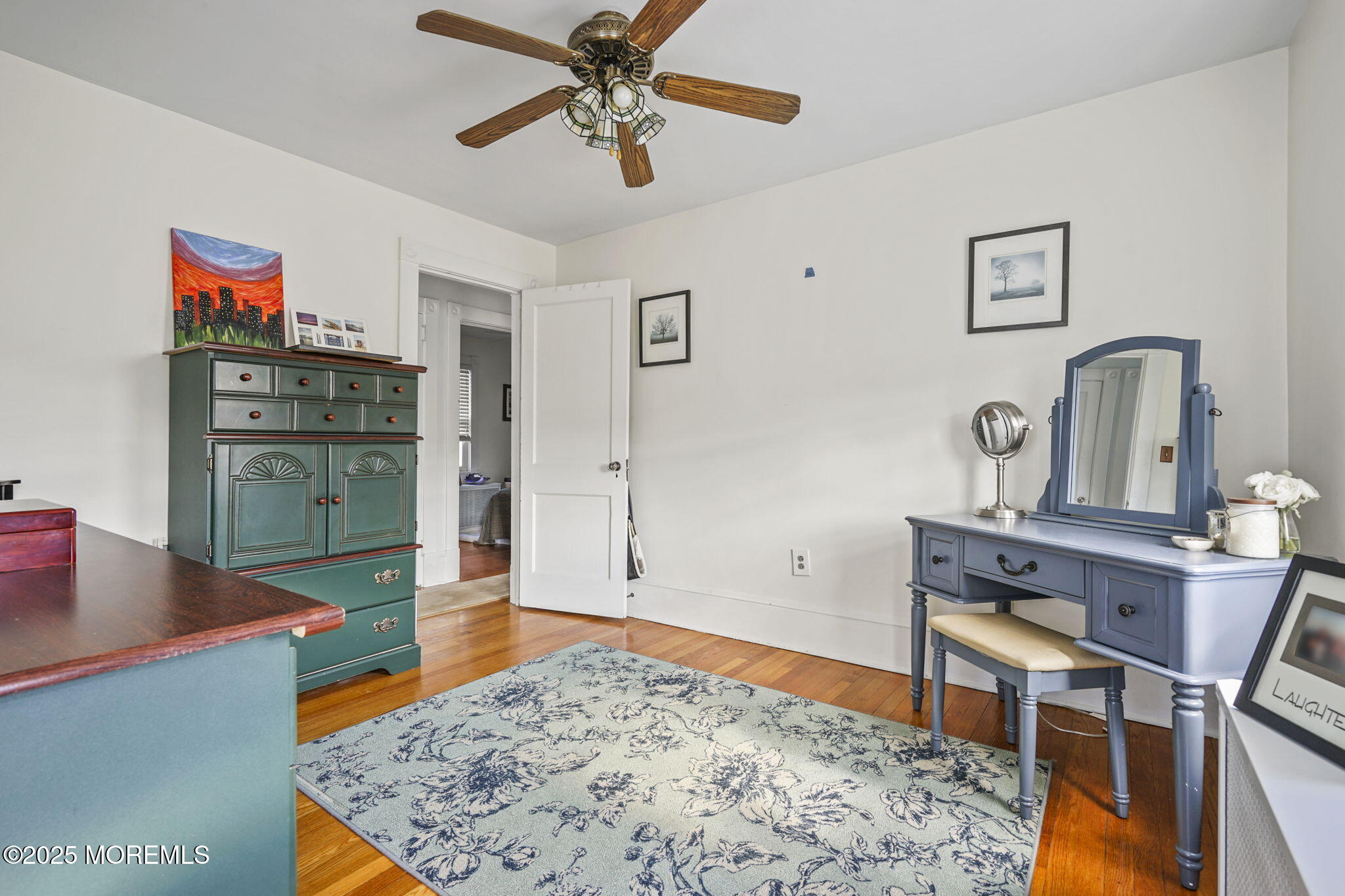 22 Albany Road Neptune Township, NJ 07753 - Photo 17 of 40 a bedroom with a bed and a dresser in it