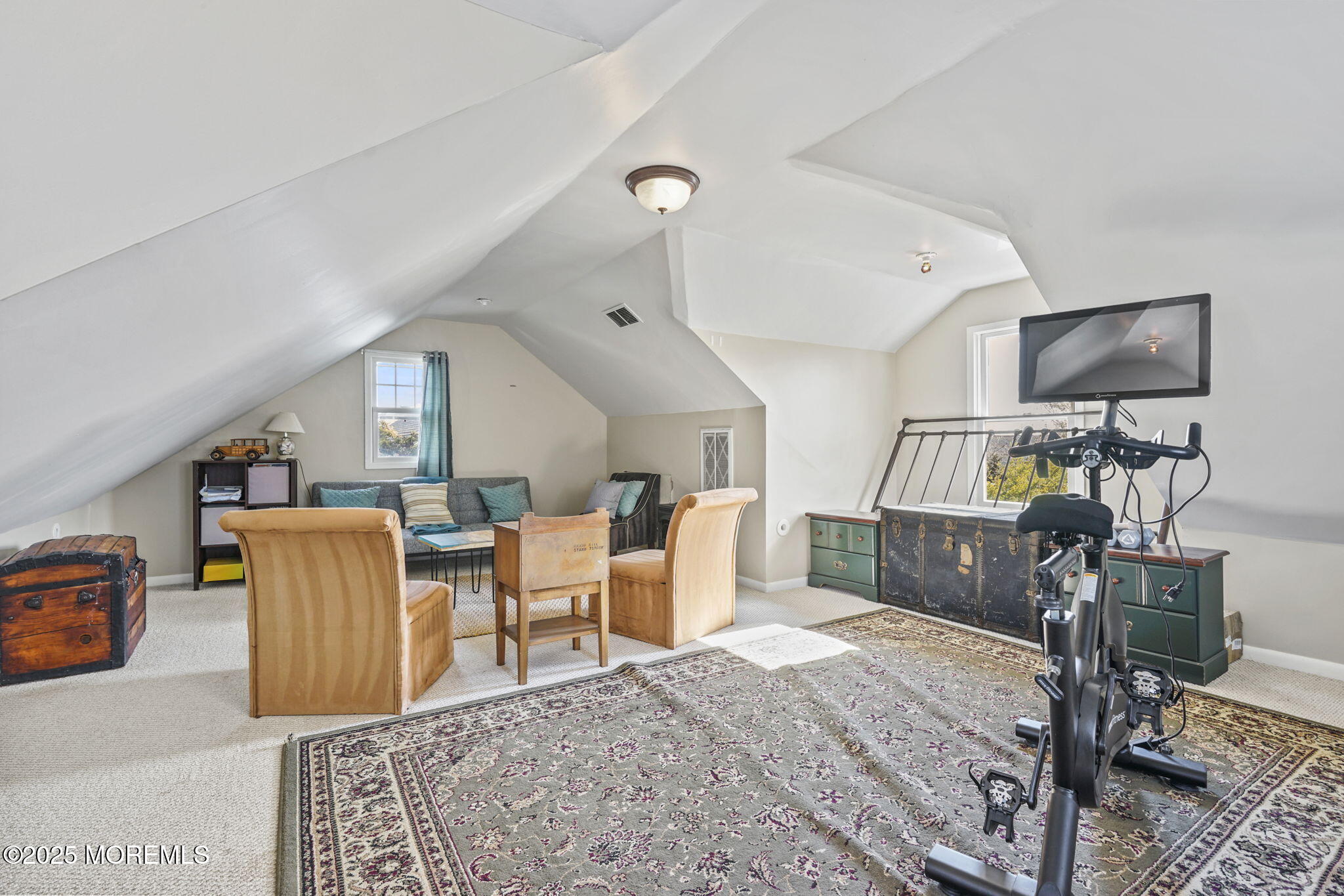 22 Albany Road Neptune Township, NJ 07753 - Photo 21 of 40 a living room with furniture and a flat screen tv