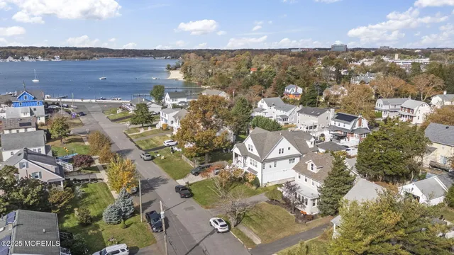 an aerial view of residential building with parking space