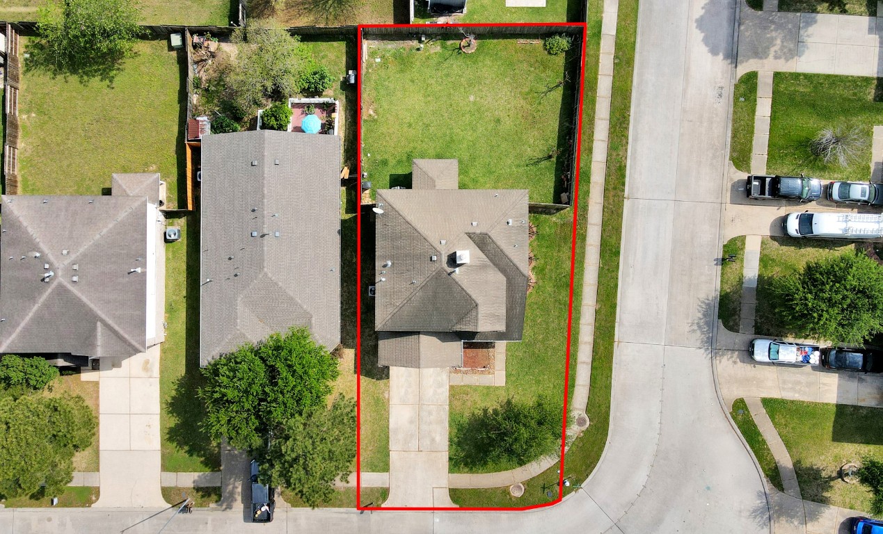 2406 Gwenfair Drive Spring, TX 77373 - Photo 2 of 44 an aerial view of a house with swimming pool and outdoor seating