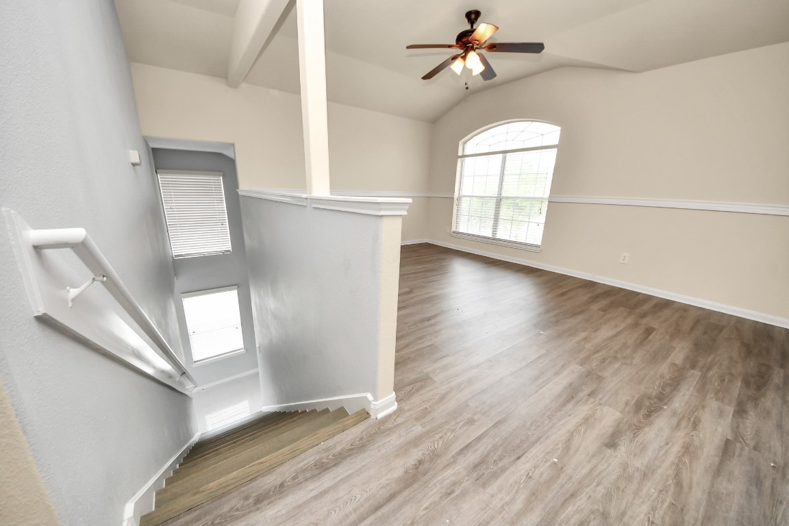 2406 Gwenfair Drive Spring, TX 77373 - Photo 22 of 44 wooden floor in an empty room with a window