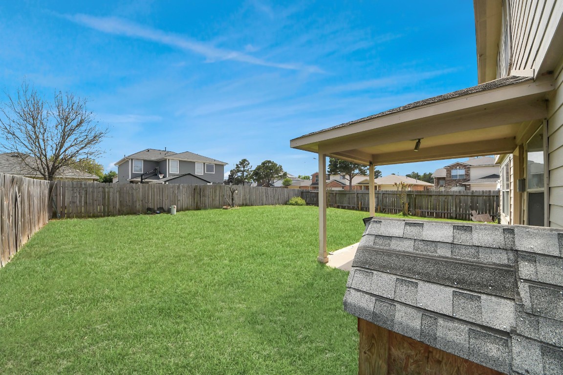 2406 Gwenfair Drive Spring, TX 77373 - Photo 37 of 44 a view of a garden with patio