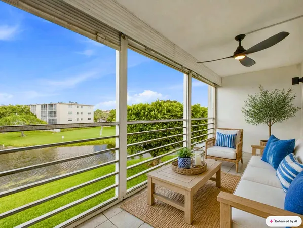 a view of a patio with couches and table and chairs