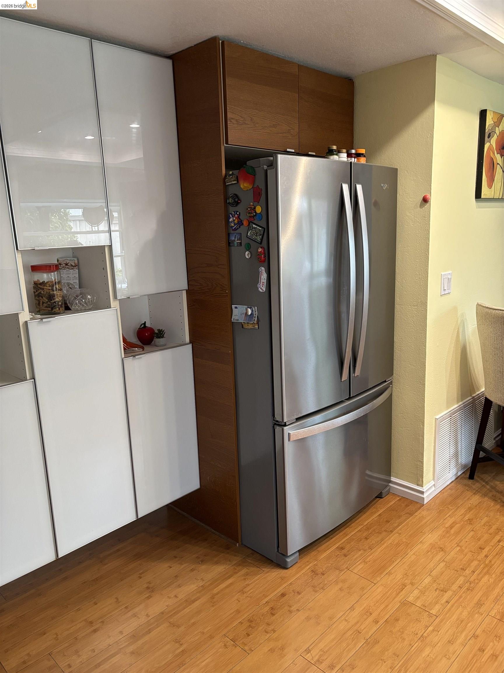 10013 Foxboro Circle San Ramon, CA 94583 - Photo 10 of 39 a metallic refrigerator freezer sitting in a kitchen